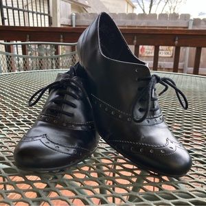 Black pair of lace up shoes Predictions brand size 7 1/2. Gently used.